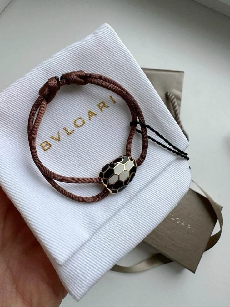 Foto real da pulseira Bvlgari Serpenti marrom